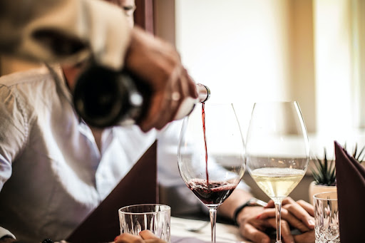 https://www.pexels.com/photo/crop-man-pouring-red-wine-in-glass-in-restaurant-3756623/